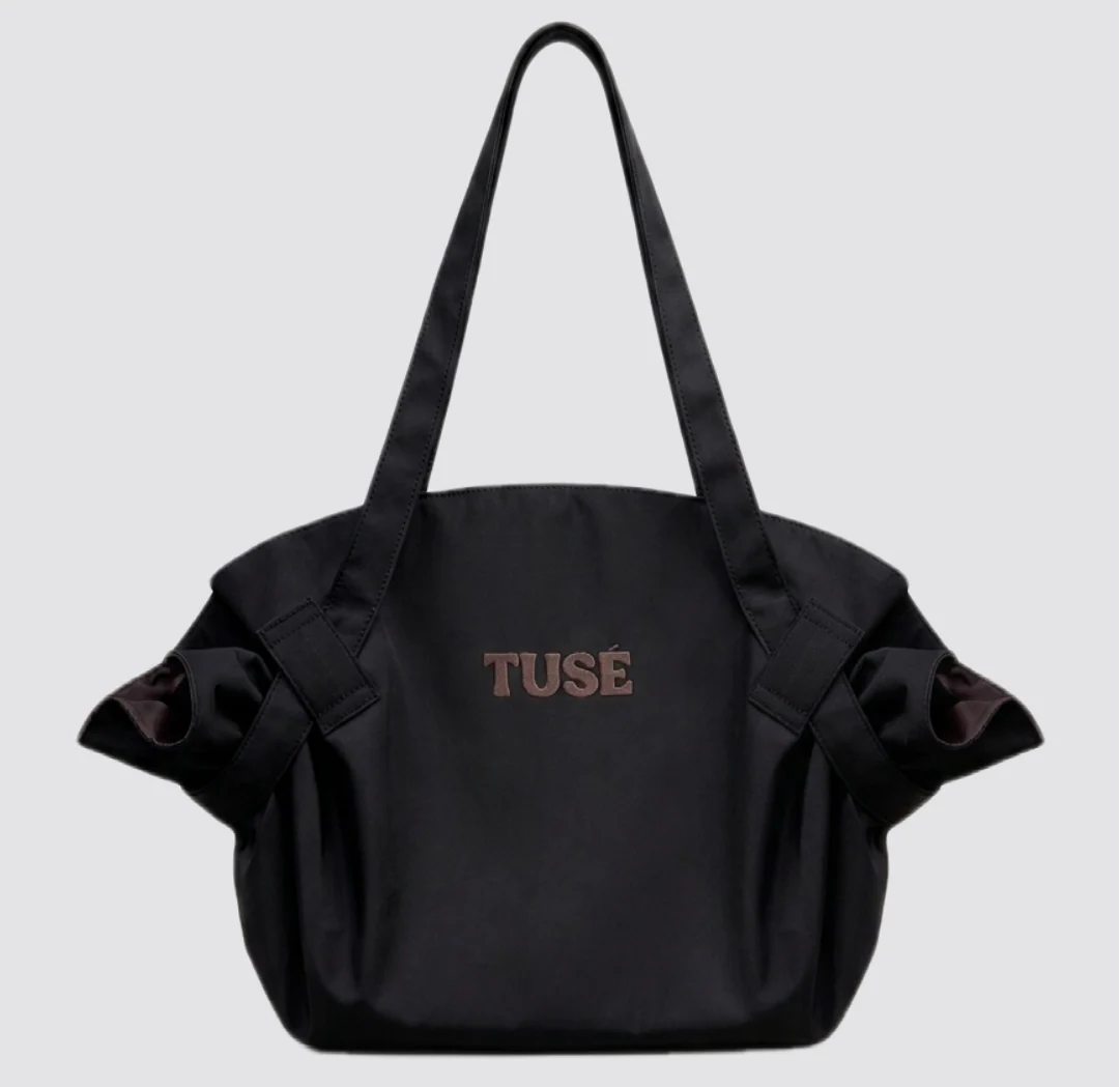 New black TUSÉ